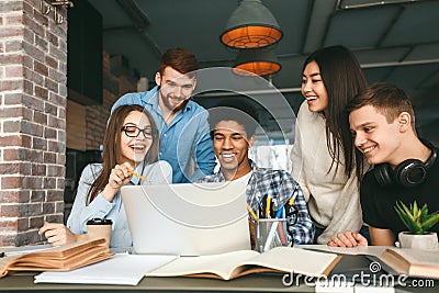 Studying together. College students preparing for classes in library Stock Photo