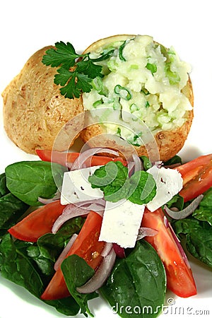 Stuffed Baked Potato And Salad Stock Photo