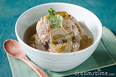 Stuffed bitter gourd with minced pork in clear soup Stock Photo