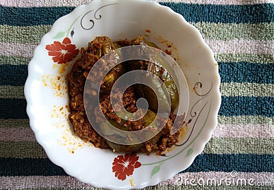 Stuffed Brinjal Indian Dish Baingan Bharwan.Indian, Maharashtrian side dish or appetizer Bharli Vangi, stuffed Eggplants, Crispy b Stock Photo