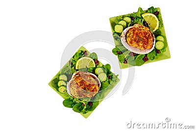 Stuffed clams with crabmeat and bread crumbs with salad and lemon isolated on white background. Seafood concept Stock Photo