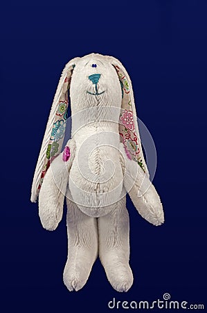 Stuffed soft funny white hare Stock Photo