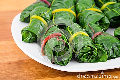 Stuffed swiss chard leaves rolls Stock Photo