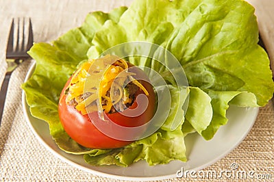 Stuffed Tomato Topped with Cheddar Cheese Stock Photo