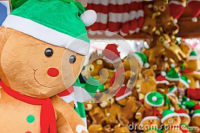 Stuffed toy gingerbread man on display awarded as winning prizes at Winter Wonderland in London Stock Photo