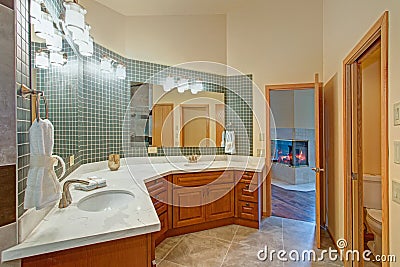 Stunning bathroom with a double vanity with marble top. Stock Photo