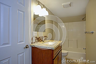 Stunning bathroom with mosaic tile backsplash. Stock Photo