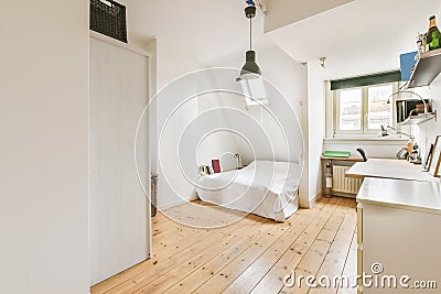 Stunning bedroom with a window Stock Photo