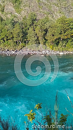 stunning blue waters of Petrohue river and rapids in Puerto Varas, Chile. Saltos del Petrohue Stock Photo