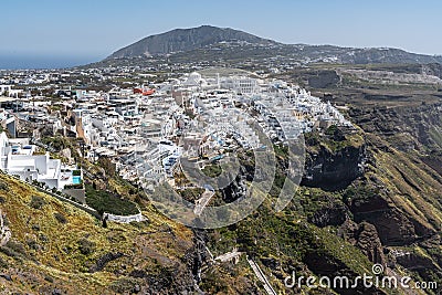 Stunning cityscape of Fira, the main town of Santorini overlooking the caldera in Greece Stock Photo