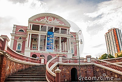 Stunning Colorful Manaus Opera House, Famous One Day Excursions. One Most Beautiful Building With a Minted Brazilian Flag in Editorial Stock Photo