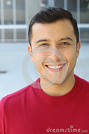 Stunning ethnically ambiguous male with blue eyes Stock Photo
