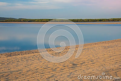 Stunning lake with sandy beach Stock Photo