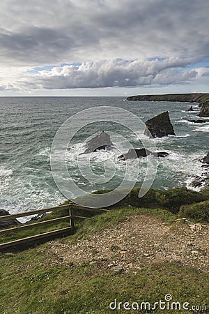 Stunning landcape image of Bedruthan Steps on Cornwall coast in Stock Photo