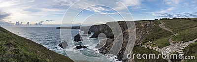 Stunning landcape image of Bedruthan Steps on Cornwall coast in Stock Photo