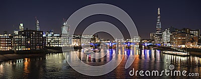 Beautiful London City skyline landscape at night with glowing ci Stock Photo