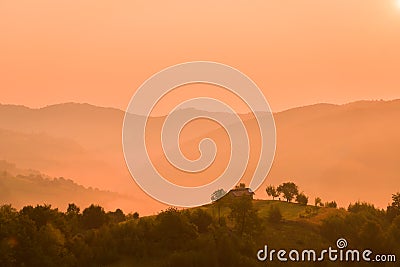 Stunning nature with misty landscape,Holbav village,Carpathians,Transylvania,Romania,Europe Stock Photo