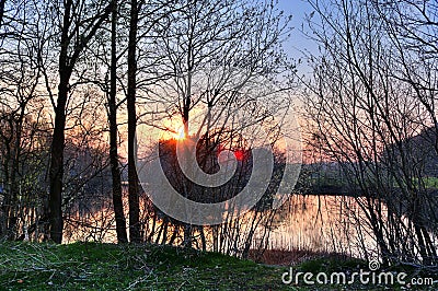 Stunning orange sunset on a landscape in northern germany Stock Photo