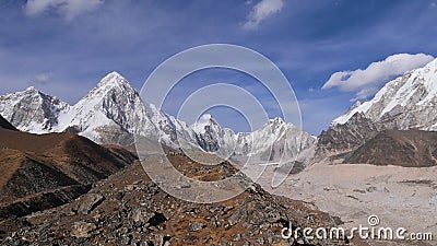 Stunning panorama view over Khumbu glacier with majestic snow-capped mountain Pumori in the Himalayas in Nepal. Stock Photo