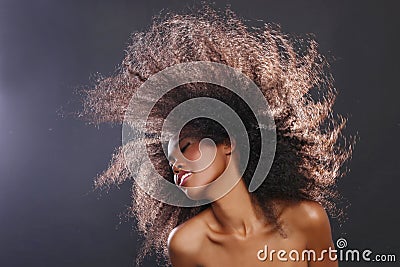 Stunning Portrait of an African American Black Woman With Big Ha Stock Photo