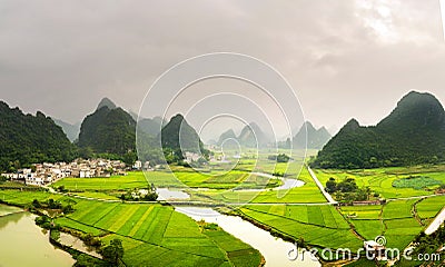 Stunning rice field view with karst formations China Stock Photo