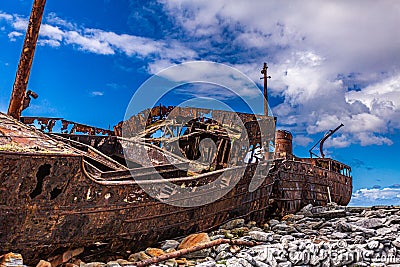 Stunning side view of the of the Plassey shipwreck on the rocky beach of Inis Oirr island Stock Photo