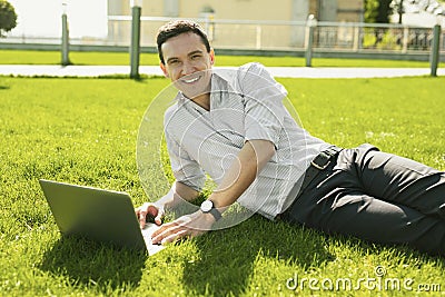 Stunning smart man wearing trendy clock at work Stock Photo