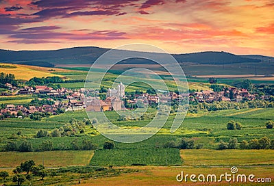 Stunning sunrise in Petrestii de Jos village. Stock Photo