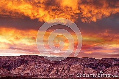 Stunning sunset in cloudy sky Stock Photo