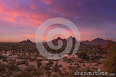 Stunning sunset over Phoenix, Arizona, Papago Park in foreground. Stock Photo