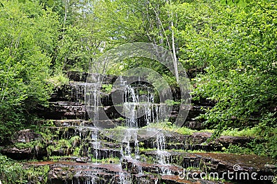 Stunning Tupavica waterfall and green trees around it Stock Photo