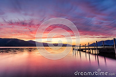 Stunning Vibrant Sunset At Ashness Jetty In Keswick, The Lake District, UK. Stock Photo