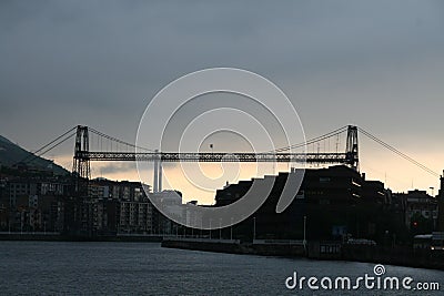Stunning view of the historic bridge in Portugalete, Spain, under the night sky Stock Photo