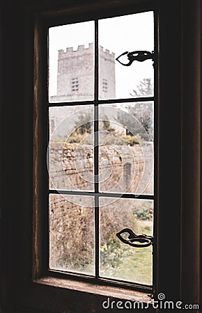 Stunning view of a majestic old castle from a window. Stock Photo