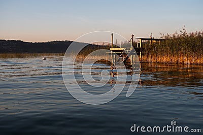 Stunning view of the unique Murtensee during Sunset in Switzerland Stock Photo