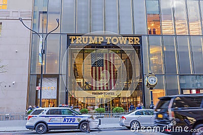 A stunning vista of the majestic entrance to Trump Tower in New York City, by the hustle and bustle of street traffic. Editorial Stock Photo