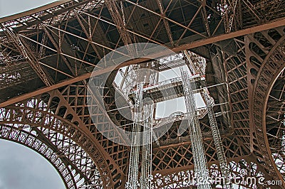 Stunning wide shot of the Eiffel Tower in detail with dramatic sky. Stock Photo