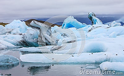 Stunning winter day view of Jokulsarlon, glacial river lagoon, large glacial lake, southeast Iceland, on the edge of VatnajÃ¶kull Stock Photo