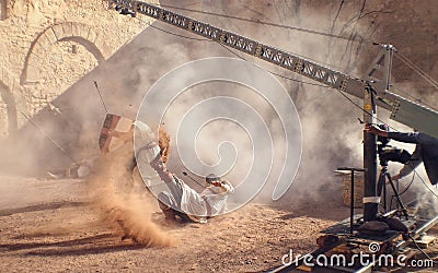 Stunt Man Shot With Arrow Falls On Medieval Film Set Stock Photo
