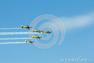 Stunt plane formation flying at Deva Airshow. Editorial Stock Photo