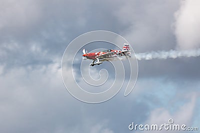 Stunt Plane - One side of the G Force Aeros little and large Editorial Stock Photo