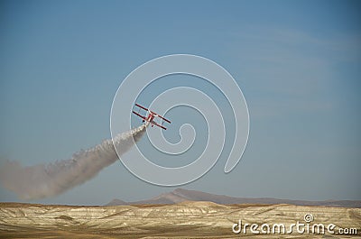 A stunt plane performance at an air show. Stock Photo