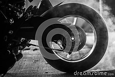 stunt rider ride and burn wheel tire Stock Photo