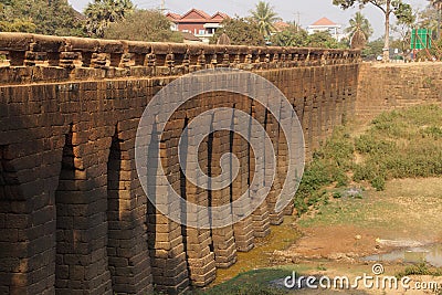 Sturdy corbeled arches of Angkor bridge, Stock Photo
