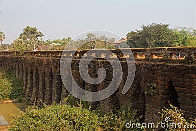 Sturdy corbeled arches of Angkor bridge, Stock Photo