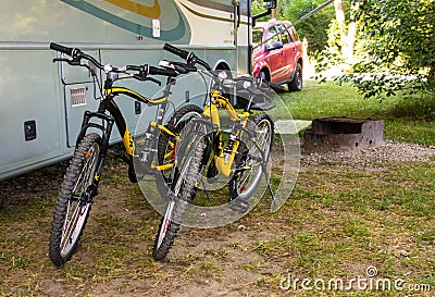 Sturdy mountain bicycles used for exploring nature by the occupants of a motor home Editorial Stock Photo