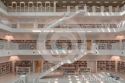 Stuttgart, Germany - Aug 1, 2020 - Few people at Stadtbibliothek library with sun light during covid-19 pandemic time Editorial Stock Photo