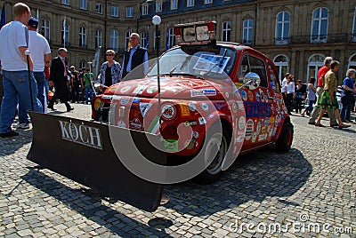 Fiat 500 as snowplow Editorial Stock Photo