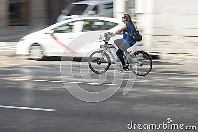 Style photos of a bike riding on the streets of Madrid Editorial Stock Photo