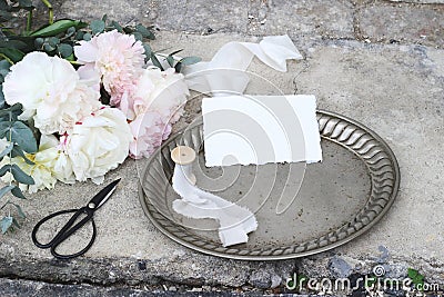 Styled stock photo. Feminine wedding still life composition with vintage silver tray, old scissors and silk ribbons Stock Photo